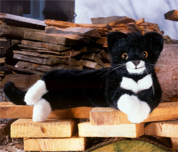 Plush black and white cat sales